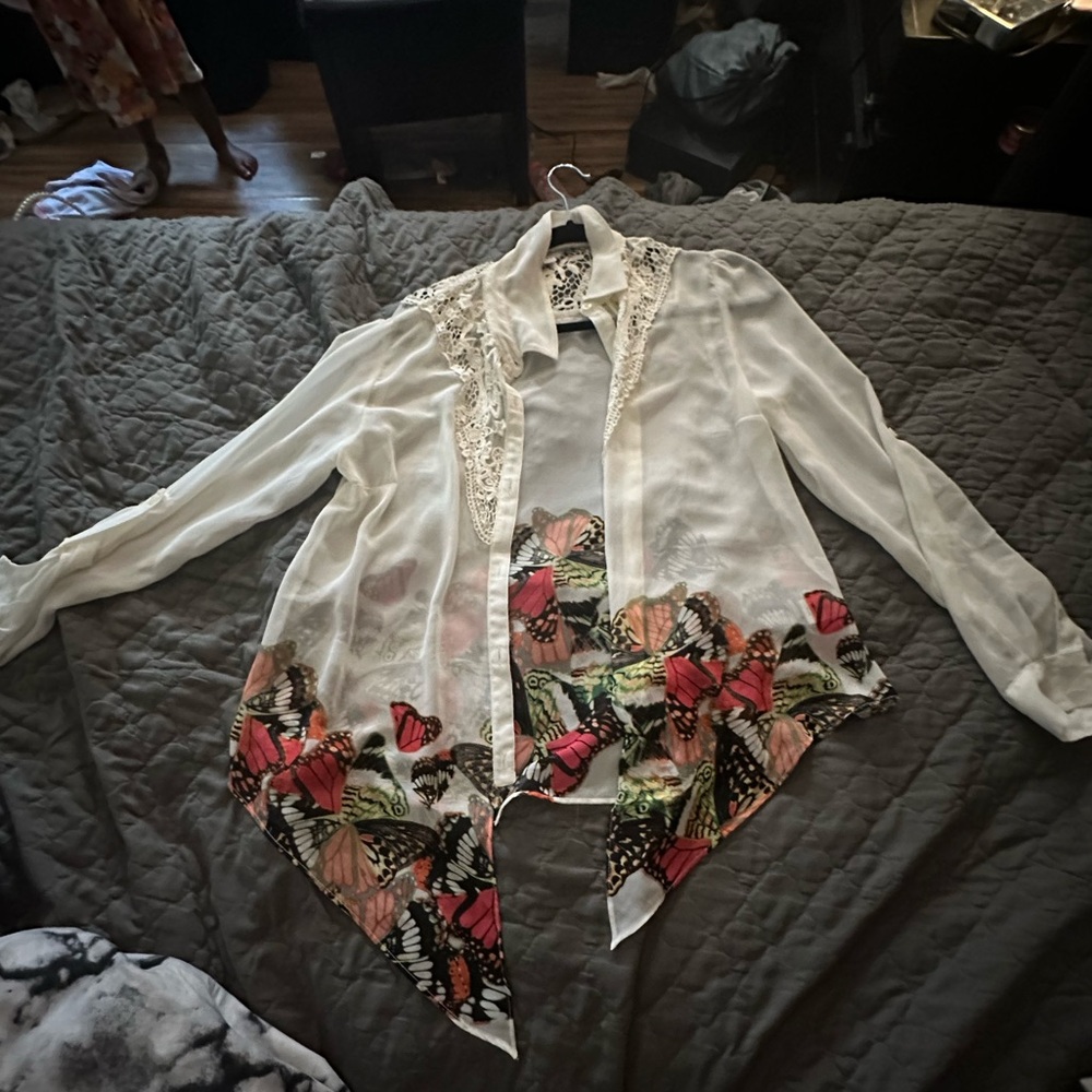 Brand: Candies Size large. Cute butterfly thin comfortable blouse.